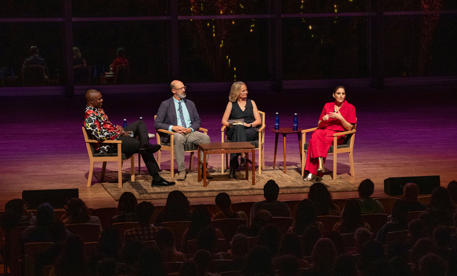 Three Skidmore professors sit with author Suleika Jaouad on the stage of Zankel Music Center